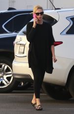 CHARLIZE THERON Out and About in Van Nuys 02/20/2018
