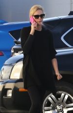 CHARLIZE THERON Out and About in Van Nuys 02/20/2018