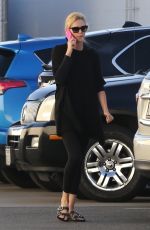 CHARLIZE THERON Out and About in Van Nuys 02/20/2018