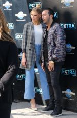 CHARLOTTE MCKINNEY and Danny Abeckaser on the Set of Extra in New York 02/01/2018