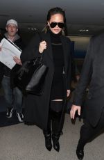 CHRISSY TEIGEN at Los Angeles International Airport 02/23/2018