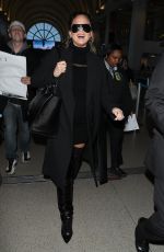 CHRISSY TEIGEN at Los Angeles International Airport 02/23/2018