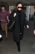 CHRISSY TEIGEN at Los Angeles International Airport 02/23/2018