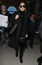 CHRISSY TEIGEN at Los Angeles International Airport 02/23/2018