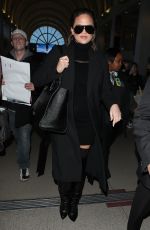 CHRISSY TEIGEN at Los Angeles International Airport 02/23/2018