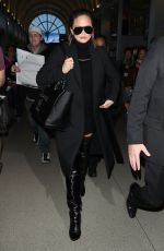 CHRISSY TEIGEN at Los Angeles International Airport 02/23/2018