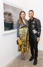 CHRISSY TEIGEN at Nabil Elderkin Exhibition in Los Angeles 02/15/2018