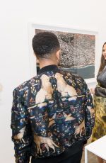 CHRISSY TEIGEN at Nabil Elderkin Exhibition in Los Angeles 02/15/2018