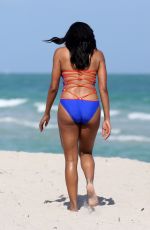 CLAUDIA JORDAN in Swimsuit on the Beach in Miami 02/13/2018