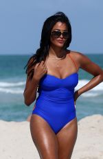 CLAUDIA JORDAN in Swimsuit on the Beach in Miami 02/13/2018