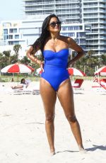 CLAUDIA JORDAN in Swimsuit on the Beach in Miami 02/13/2018