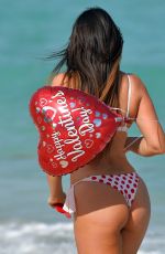 CLAUDIA ROMANI in Red and White Bikini on Valentine