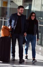 COURTENEY COX and Johnny McDaid at Heathrow Airport in London 02/17/2018