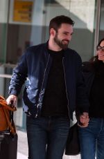 COURTENEY COX and Johnny McDaid at Heathrow Airport in London 02/17/2018