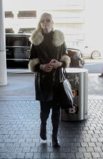 ELLE FANNING Arrives at LAX Airport in Los Angeles 02/13/2018
