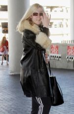 ELLE FANNING Arrives at LAX Airport in Los Angeles 02/13/2018