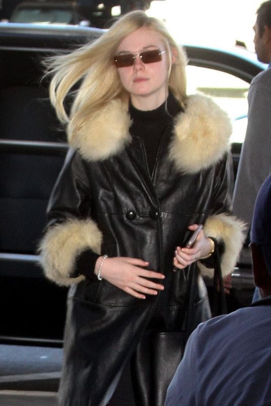 ELLE FANNING Arrives at LAX Airport in Los Angeles 02/13/2018