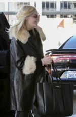 ELLE FANNING Arrives at LAX Airport in Los Angeles 02/13/2018