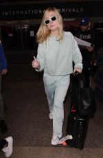 ELLE FANNING at Los Angeles International Airport 02/21/2018