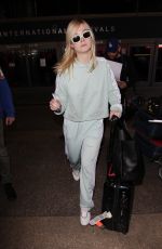 ELLE FANNING at Los Angeles International Airport 02/21/2018