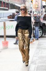 HAILEY BALDWIN in a Gold Pants Out in New York 02/09/2018
