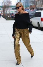 HAILEY BALDWIN in a Gold Pants Out in New York 02/09/2018