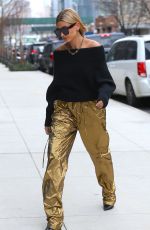 HAILEY BALDWIN in a Gold Pants Out in New York 02/09/2018