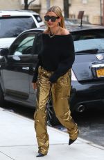 HAILEY BALDWIN in a Gold Pants Out in New York 02/09/2018