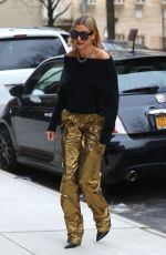 HAILEY BALDWIN in a Gold Pants Out in New York 02/09/2018
