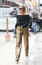 HAILEY BALDWIN in a Gold Pants Out in New York 02/09/2018