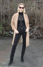 HAILEY CLAUSON Arrives at Roberto Cavalli Show at Milan Fashion Week 02/24/2018