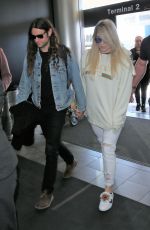 KESHA SEBERT and Brad Ashenfelter at LAX Airport in Los Angeles 02/19/2018
