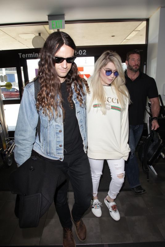 KESHA SEBERT and Brad Ashenfelter at LAX Airport in Los Angeles 02/19/2018