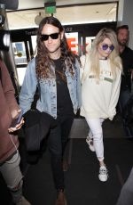 KESHA SEBERT and Brad Ashenfelter at LAX Airport in Los Angeles 02/19/2018