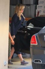 KHLOE KARDASHIAN Arrives at Friend