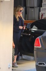 KHLOE KARDASHIAN Arrives at Friend