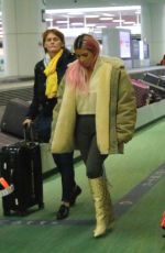 KIM and KOURTNEY KARDASHIAN at Haneda International Airport 02/26/2018