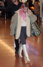 KIM and KOURTNEY KARDASHIAN at Haneda International Airport 02/26/2018