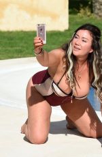 LISA APPLETON in Swmisuit at a Pool in Spain 02/15/2018