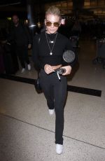 LOUISA JOHNSON at LAX Airport in Los Angeles 02/16/2018