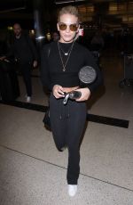 LOUISA JOHNSON at LAX Airport in Los Angeles 02/16/2018