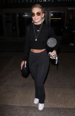 LOUISA JOHNSON at LAX Airport in Los Angeles 02/16/2018