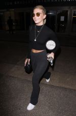 LOUISA JOHNSON at LAX Airport in Los Angeles 02/16/2018