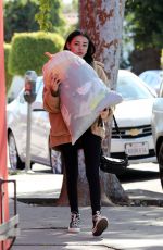 MADISON BEER Gives a Big Bag of Clothes Away to Charity in Los Angeles 02/20/2018