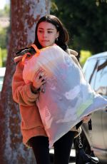 MADISON BEER Gives a Big Bag of Clothes Away to Charity in Los Angeles 02/20/2018