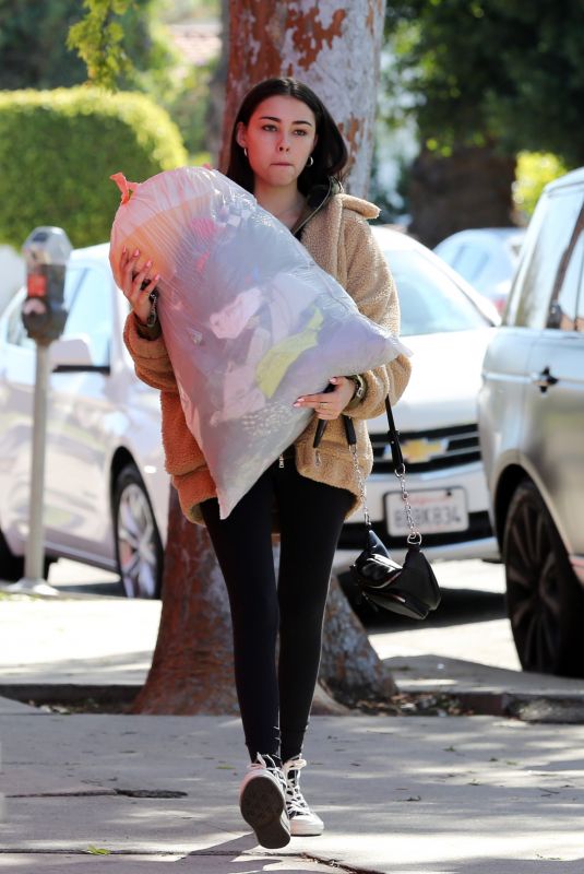 MADISON BEER Gives a Big Bag of Clothes Away to Charity in Los Angeles 02/20/2018