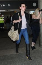 MILLA JOVOVICH at Los Angeles International Airport 02/08/2018