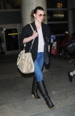 MILLA JOVOVICH at Los Angeles International Airport 02/08/2018