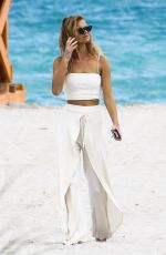 NADINE LEOPOLD in Bikinis at a Photoshoot on the Beach in Miami 02/06/2018