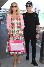 PARIS HILTON and Chris Zylka at LAX Airport in Los Angeles 02/08/2018